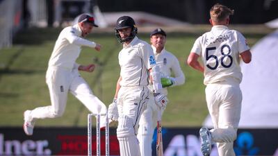 England captain Joe Root, left, celebrates after the dismissal of New Zealand's Kane Williamson during the second day of the first Test at Mount Maunganui. AFP