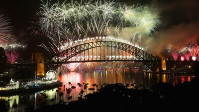 Fireworks explode off the Sydney Harbour Bridge during the midnight fireworks display on New Year's Eve on Sydney Harbour. Cameron Spencer / Getty Images