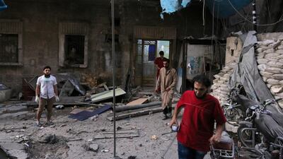 Medics inspect the damage outside a field hospital after an airstrike on the rebel-held Al Maadi neighbourhood of Aleppo on September 28, 2016. Abdalrhman Ismail/Reuters