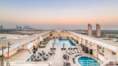 Dusit Thani Abu dhabi at sunset. The hotel is tailor-made for business travellers. Courtesy Dusit Thani