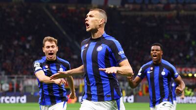 Edin Dzeko celebrates with teammates after scoring for Iinter Milan in the Champions League semi-final first leg against AC Milan at the San Siro on May 10, 2023. Getty