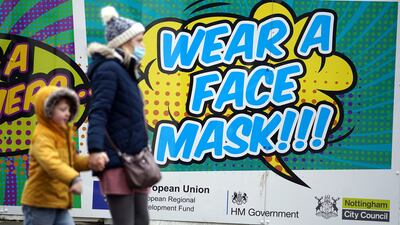 Christmas shoppers in the UK. The country is preparing for a restricted festive season. PA