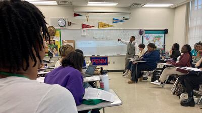 An instructor teaches AP African-American studies to a group of pupils in Baton Rouge, Louisiana. AP