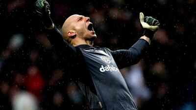 Brad Guzan of Aston Villa celebrates his team's third goal against Norwich City at Villa Park on Sunday March 2, 2014. Ben Hoskins / Getty Images