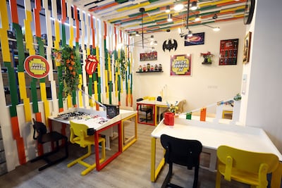 The Brick Borrow UAE shop allows fans to browse the collection as well as sit down to build. Chris Whiteoak / The National
