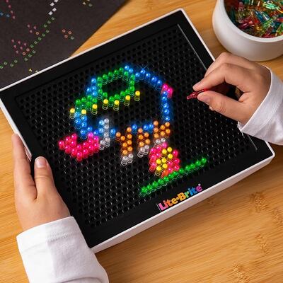 Lite-Brite comes in themes such as Pokemon, Scooby-Doo and Barbie. Photo: Basic Fun