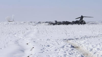 A view of the wreckage of a US Air Force E-11A plane a day after it was crashed in Deh Yak district of Ghazni, Afghanistan, 28 January 2020. EPA/STR
