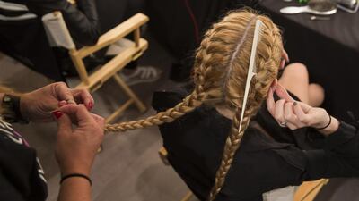 A model is prepared backstage before the thirteen year old designer Isabella Rose Taylor Spring/Summer 2015 collection during New York Fashion Week on September 9, 2014. Lucas Jackson / Reuters