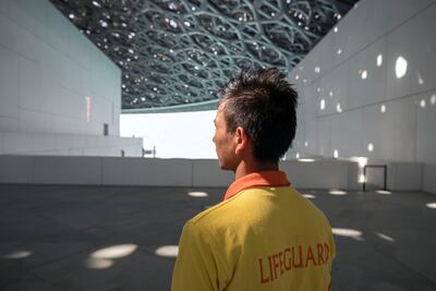 Lifeguards at the Louvre. Chris Whiteoak / The National