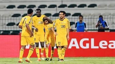 Al Wasl team members celebrate the goal against Al Shabab. Sarah Dea / The National