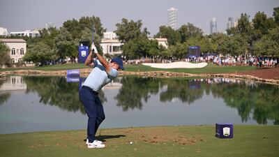 Rory McIlroy tees off on the sixth hole at Jumeirah Golf Estates. Getty Images