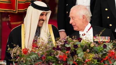 King Charles and Sheikh Tamim. PA