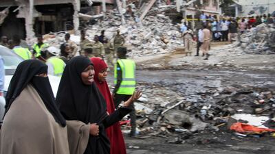 Somali women react at the scene of Saturday's blast. Farah Abdi Warsameh / AP Photo