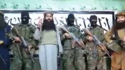 This still image taken from a video released by Umar Narai's faction of the Pakistani Taliban on January 22, 2016, shows Narai (C) with other militants in the group, delivering a statement from an undisclosed location. AFP Photo