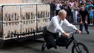 David Letterman riding a go kart powered by the reaction from mixing 648 Mentos candies into 108 two-litre bottles of Coke while taping a segment for The Late Show with David Letterman in New York. AP