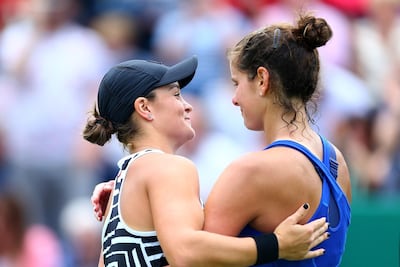 Ashleigh Barty embraces friend and doubles partner Julia Gorges after victory in the Birmingham final on Sunday. Jordan Mansfield / Getty Images