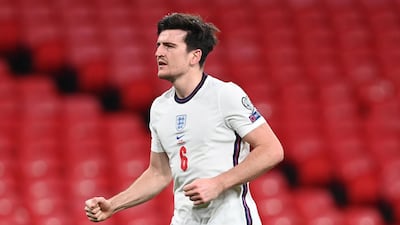 Harry Maguire celebrates scoring the winner against Poland. EPA