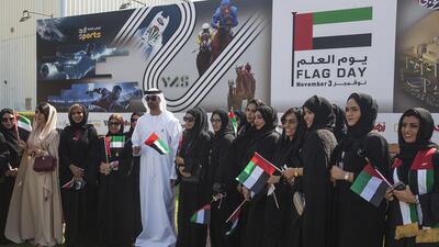HE Mohamed Ebraheem Al Mahmood, Abu Dhabi Media Chairman and Managing Director, with employees at the company's flag raising ceremony on Thursday, November 3 2016. Mona Al Marzooqi / The National