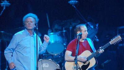 Paul Simon, right, with Art Garfunkel at Madison Square Garden in 2003.