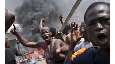 The political stand-off in the Ivory Coast has led to violent street protests. One reader blames the United States and France for backing one presidential contender in the interest of gaining economic concessions. Thibault Camus / AP