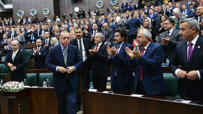 Turkish President Recep Tayyip Erdogan prepares to address the parliament in Ankara, EPA