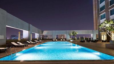 The outdoor swimming pool at Hotel Nikko Saigon has a terrace that overlooks Ho Chi Minh City. Courtesy Nikko Saigon