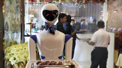 Ruby the robot serves diners in the Drink and Spice Magics restaurant in Bur Dubai, Dubai. Pawan Singh / The National