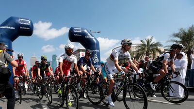 Cyclists start the second stage of the Dubai Tour cycling race.
