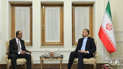 Iran Foreign Minister Hossein Amir-Abdollahian, right, with Bader Abdullah Al Munaikh, Kuwait's new ambassador to Iran, in Tehran. AFP