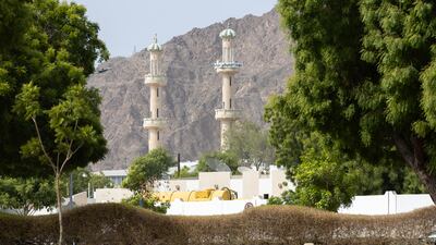 Footage on social media showed dozens of people fleeing the Imam Ali Mosque, its minaret visible, as gunshots rang out. Photo: The National