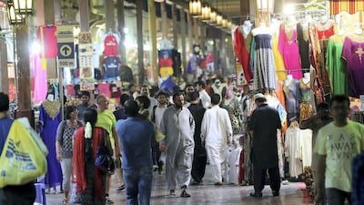 The main thoroughfare at the Bur Dubai souq is busiest at night, all year round. Chris Whiteoak / The National