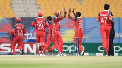 Oman celebrate are well placed at the T20 World Cup Qualifier having won three of their four matches so far. Courtesy Abu Dhabi Sports Council.