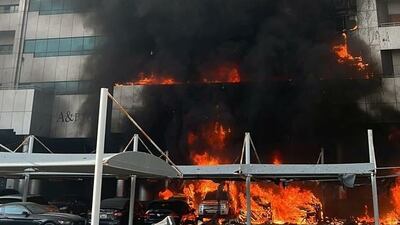 A number of apartments and cars were damaged in the blaze. Photo: Ajman Police