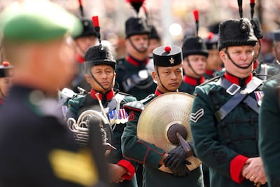 Members of the Brigade of Gurkhas on Horse Guards Road during the state funeral of Queen Elizabeth II at Westminster Abbey. PA