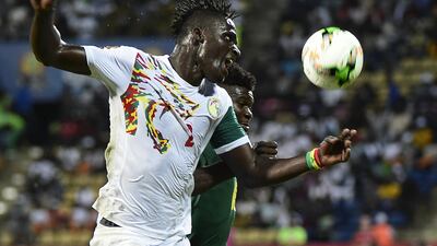 Senegal's defender Kara Mbodji, left. Khaled Desouki / AFP