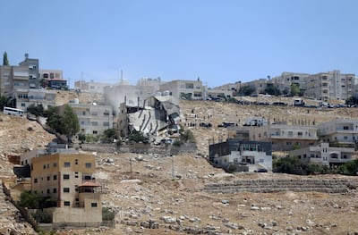 Jordanian emergency services and security forces have locked down a damaged building used by a terror cell. Getty Images