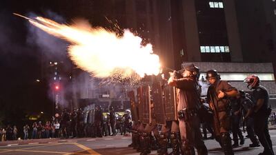 Police fire tear gas grenades at supporters of suspendend president Dilma Rousseff holding a demonstration during her impeachment trial in Sao Paulo, Brazil. Rousseff who testified for the first time at her trial urged the Senate in Brasilia to vote against impeaching her denying charges that she fiddled government accounts. Nelson Almeida / AFP