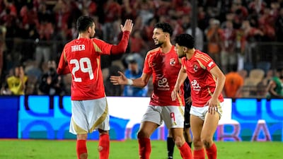 Al Ahly's Wessam Ali, centre, celebrates with teammates after scoring his team's first goal. AFP