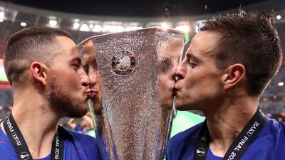 Chelsea players Eden Hazard, left, and Cesar Azpilicueta celebrate after winning last season's Europa League final. PA