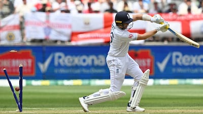 England batter Joe Root is clean bowled by Australia’s Mitchell Starc for eight. AFP