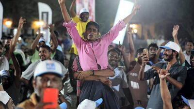 Workers enjoy the Camp Ka Champ – DU singer of the Season competition.