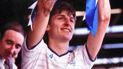 Chelsea captain Colin Pates lifts the Full Members' Cup trophy. Getty Images