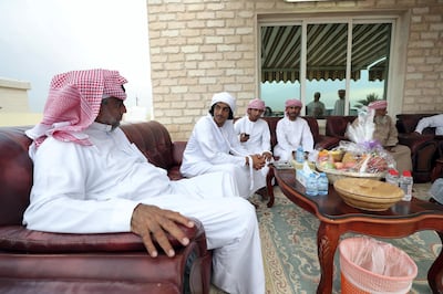 Camel owners unwind after competition at the Marmoom season finals in April last year. Chris Whiteoak / The National