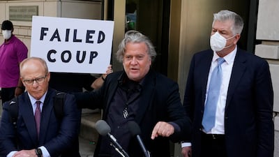 Mr Bannon speaks to reporters after leaving US District Court in Washington. Reuters
