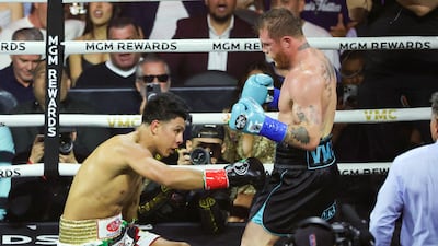 Canelo Alvarez knocks down Jaime Munguia in the fourth round. AFP
