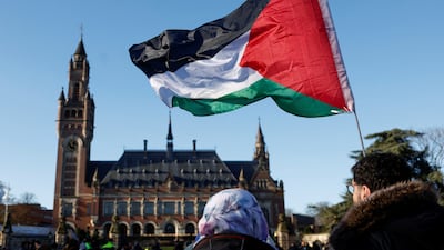 Pro-Palestine demonstrators outside the International Court of Justice in The Hague. Reuters