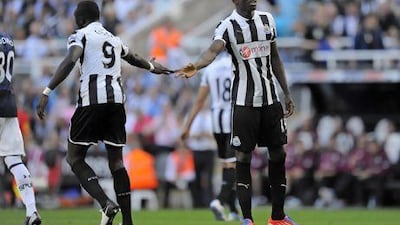 Demba Ba, right, and Papiss Cisse, left, have struggled to combine effectively in Newcastle United's 4-4-2 formation. Richard Lee / Sportimage