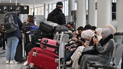 Passengers at Rafic Hariri International Airport in Beirut, where Lebanese airspace remains open but some flights have been delayed or cancelled. EPA