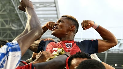Cape Verde's forward Helio Varela celebrates with teammates after scoring his team's second goal against Uruguay in Miami. AFP