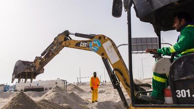 Under Abu Dhabi city’s new property law published at the end of last year, developers are now required to hold a valid construction permit before they are allowed to launch property sales. Alex Atack / Bloomberg